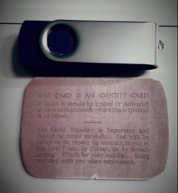 rear of I.D. card (memory stick for comparison).